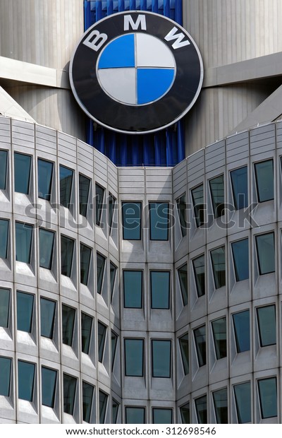 MUNICH, GERMANY - 4 AUGUST 2015:\
Opened in 1973, the BMW four cylinder tower (BMW Hochhaus\
Vierzylinder) is the world headquarters of German auto maker\
BMW.