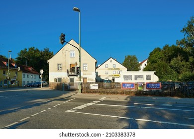 Munich, Germany; 9.14.2016: Tire Shop And Other Shops At A Crossroads In Munich6