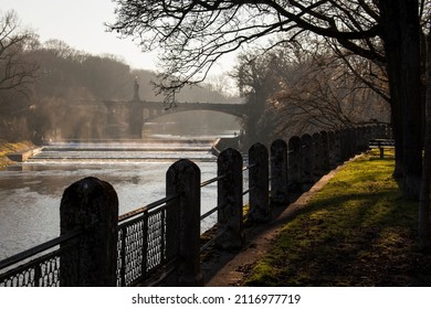 Munich, Germany - December 19,2021: Bridge On The Isar River On Winter Day.