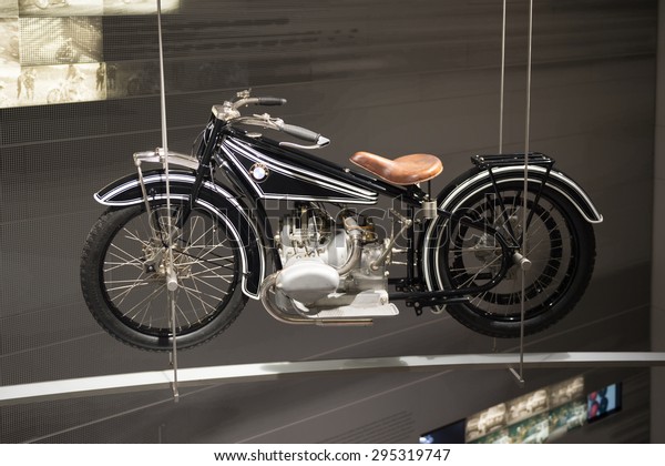 MUNICH, GERMANY - JULY 1, 2015: BMW classic\
motocycle at the BMW Museum, an automobile museum in Munich,\
Germany. It was established in\
1972