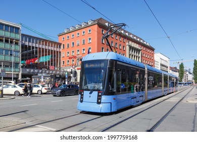 Munich, Germany - June 1, 2021: Tram Stadler Rail Variobahn Light Rail Public Transport At Main Station In Munich, Germany.