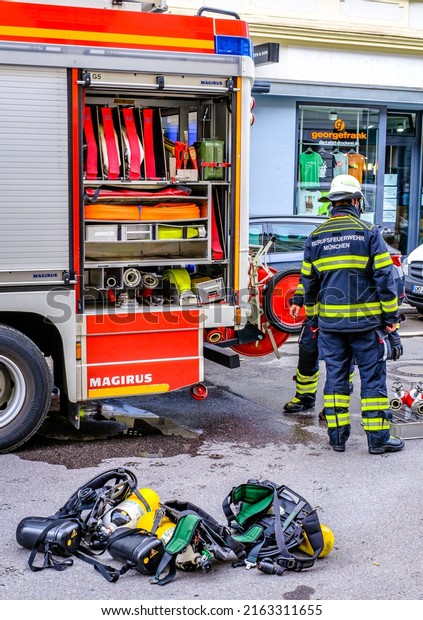 Munich, Germany - June 2: typical\
fire department truck at the old town of Munich on June 2,\
2022