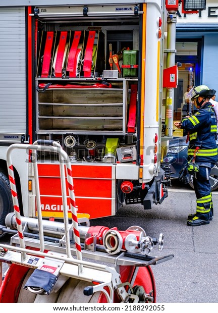Munich, Germany - June 2: typical\
fire department truck at the old town of Munich on June 2,\
2022