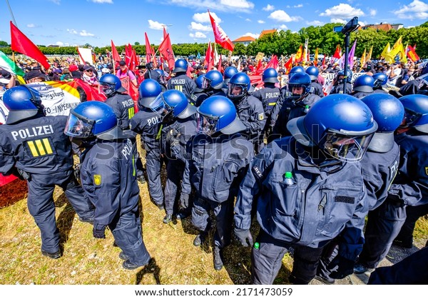 Munich,\
Germany - June 25: Police forces at a demonstration against the G7\
meeting in Elmau in Munich on June 25,\
2022