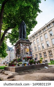 MUNICH, GERMANY - May 27 : Souvenirs Of Michael Jackson Placed Around A Statue At Promenadenplatz To Remember The Anniversary Of Death Of Michael Jackson May 27, 2019 In Munich.