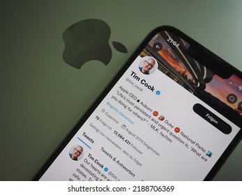 Munich, Germany - May 4th 2022: Tim Cook`s Twitter Account Displayed On An IPhone 13 With A Macbook Pro In The Background. 