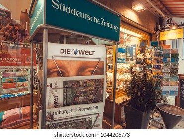 MUNICH, GERMANY - NOVEMBER 16, 2017: Newspaper Stand With Frontapage Of Tabloid Die Welt Near Street Store On Novemebr 16. 2017. Bavaria Is Famous For Breweries And Weissbier -wheat Beer