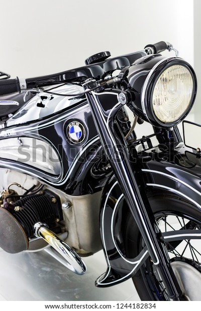 MUNICH, GERMANY - NOVEMBER 24, 2018 : Exhibition\
and achievements of the exhibits of the legendary models of cars\
and motorcycles in the BMW\
Museum.