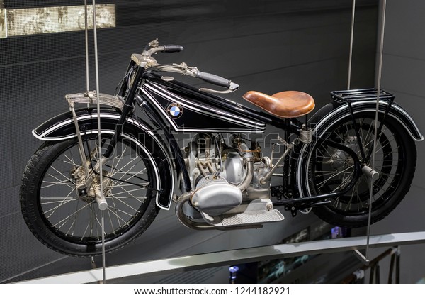 MUNICH, GERMANY - NOVEMBER 24, 2018 : Exhibition\
and achievements of the exhibits of the legendary models of cars\
and motorcycles in the BMW\
Museum.