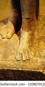 MUNICH - JUL 21, 2018 - Feet of standing striding figure of the god Horus, Egyptian Museum, Munich, Germany