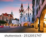 Munich Old town, Marienplatz square and the Old Town Hall tower, Germany, on dramatical sunrise