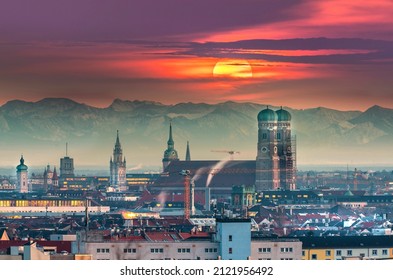 Munich skylinea aerial view, munich germany cityscape church cathedral frauenkirche downtown old town view from above, munich marienplatz swuare, alps mountain at sunset.