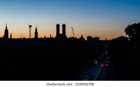 Munich Sunset City Scape Skyline With Epic Light Dark Building Silhoutte