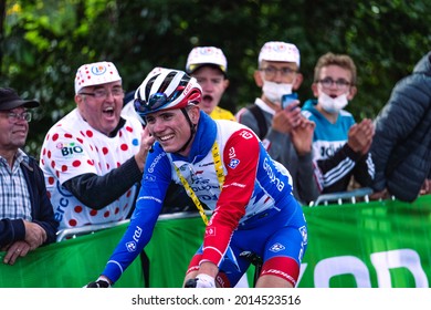 MUR DE BRETAGNE, FRANCE - Jun 27, 2021: A Professional French Cyclist David Gaudu Cycling With A Smile In Brittany, France