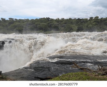 Murchison Falls Waterfall Cascading Through Rocky Gorge in Uganda