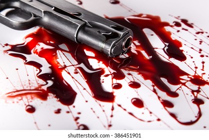 Murder Concept - Gun With Blood On White Background, Close-up.