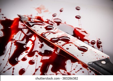 Murder Concept - Knife With Blood On White Background, Close-up.