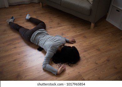 Murder, Kill And People Concept - Dead Woman Body In Blood Lying On Floor At Crime Scene (staged Photo)