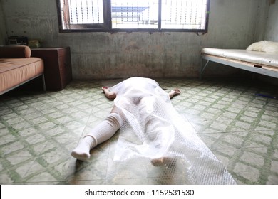 Murdered Woman, Crime Scene Concept Picture Of A Murder Victim Female Lying Dead On The Ground In The Old Room.