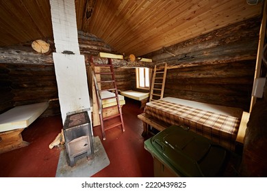 Murmansk Region, Russia - April 2018:  The Interior Of The Hunter House With A Stove, Table, Wood Trim