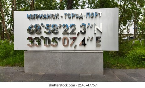 Murmansk, Russia - 23 June, 2021: Sign With Text Made Of Mirror Material. Murmansk - Port City And GPS Coordinates: 68 Degrees North Latitude, 33 Degrees East Longitude.