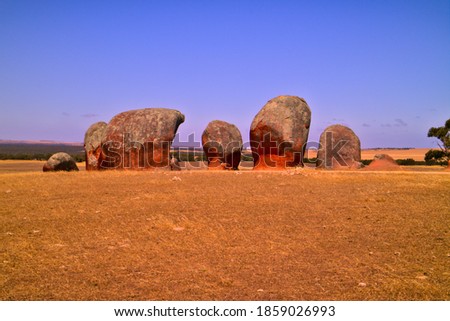 Murphy's Haystacks are granite inselbergs or boulders carved over thousands of years by ancient glacial Ice flowing past them slowly making them into their iconic haystack shape
