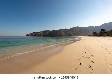 MUSANDAM, OMAN - NOVEMBER 18, 2016: The beach at Zighy Bay in the Omani enclave of Musandam