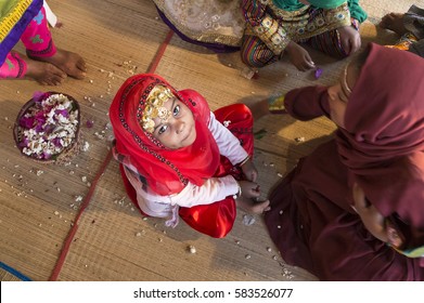 Muscat, Oman, February 4th, 2017: beautiful omani girls demonstrating a tradition of pre-wedding ceremony