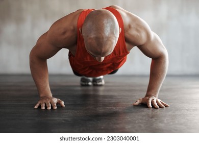 Muscle growth, strong man and floor push up for athlete fitness lifestyle, studio challenge or health goals commitment. Strength, muscular or active person workout, bodybuilding or exercise on ground - Shutterstock ID 2303040001