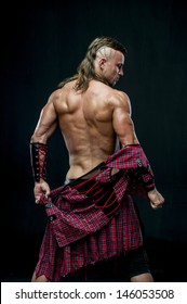 Muscled Male Model In Kilt
