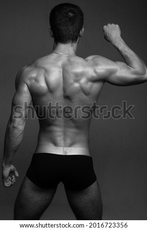 Similar – Young male bodybuilder posing