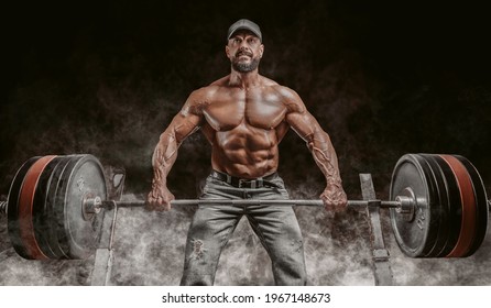 Muscular bearded man lifts a barbell. Bodybuilding, fitness, powerlifting concept. Mixed media