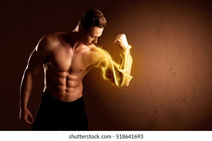 Muscular Body Builder Lifting Weight With Energy Lights On Biceps Concept