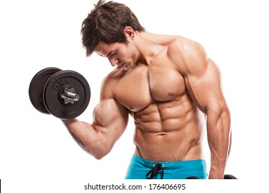 Muscular bodybuilder guy doing exercises with dumbbells isolated over white background