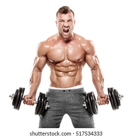 Muscular bodybuilder guy doing exercises with dumbbell over white background