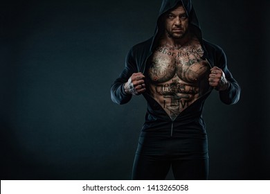 Muscular fitness sports man, atlete with chains in fitness gym. Energy and power. - Powered by Shutterstock