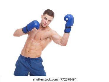 Muscular guy in boxing glove punches an uppercut on a white isolated background