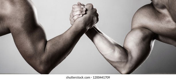  Muscular hand. Arm wrestling. Two men arm wrestling. Rivalry, closeup of male arm wrestling. Two hands. Men measuring forces, arms. Hand wrestling, compete. Hands or arms of man. Black and white.