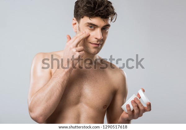 Muscular Man Applying Moisturizing Cream On Stock Photo Shutterstock