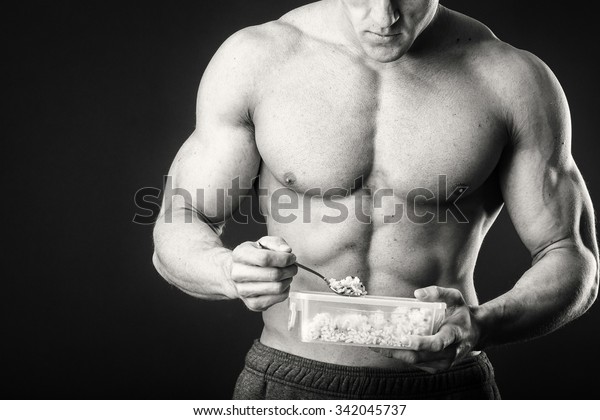 Muscular Man Eats Cottage Cheese On Stock Photo Edit Now 342045737