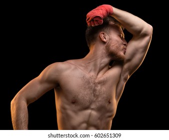 Muscular Man Kissing Biceps