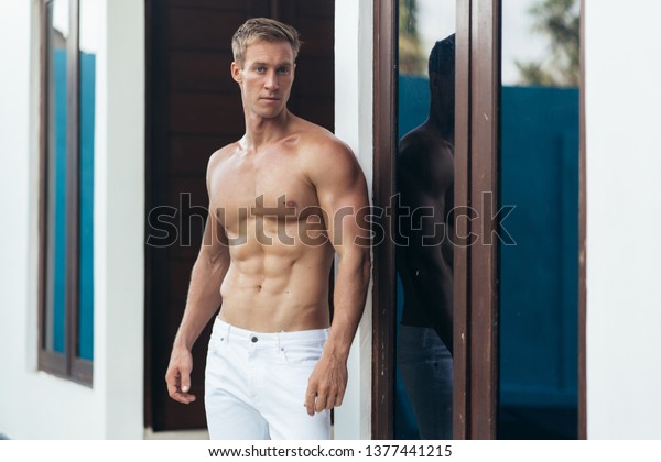 Muscular Man Naked Torso Posing On