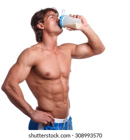Muscular Man With Protein Drink In Shaker Over White Background