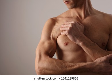 Muscular Man With Scar On His Shoulder After Surgery. Laser Scar Reduction Concept, Sport Exercising Injury