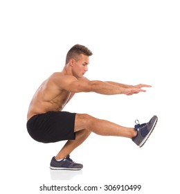 Muscular Man Showing One Leg Squat Exercise, Side View, Full Length Studio Shot Isolated On White.