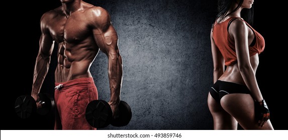 muscular man and woman standing with hands - Powered by Shutterstock