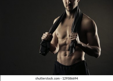 Muscular, Shirtless Man With Towel Around Neck