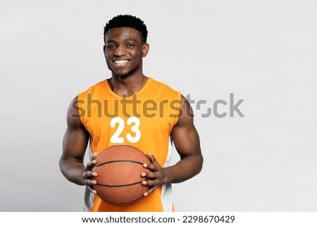 Similar – Image, Stock Photo Portrait of positive basketball player training on street court