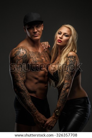 https://image.shutterstock.com/image-photo/muscular-tattooed-man-his-blond-450w-326357708.jpg