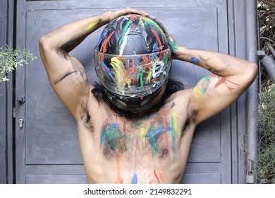 Muscular Unrecognizable Motorcycle Rider With Artsy Body Paint